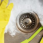 cleaning a kitchen sink drain