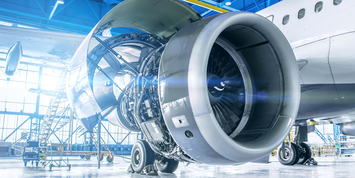 Industrial theme view. Repair and maintenance of aircraft engine on the wing of the aircraft.